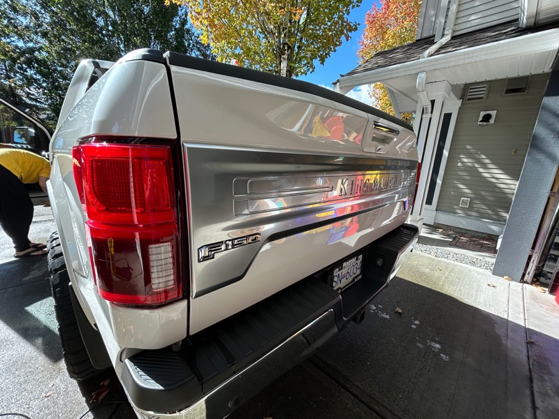 Ford F-150 tailgate and taillight after a wash