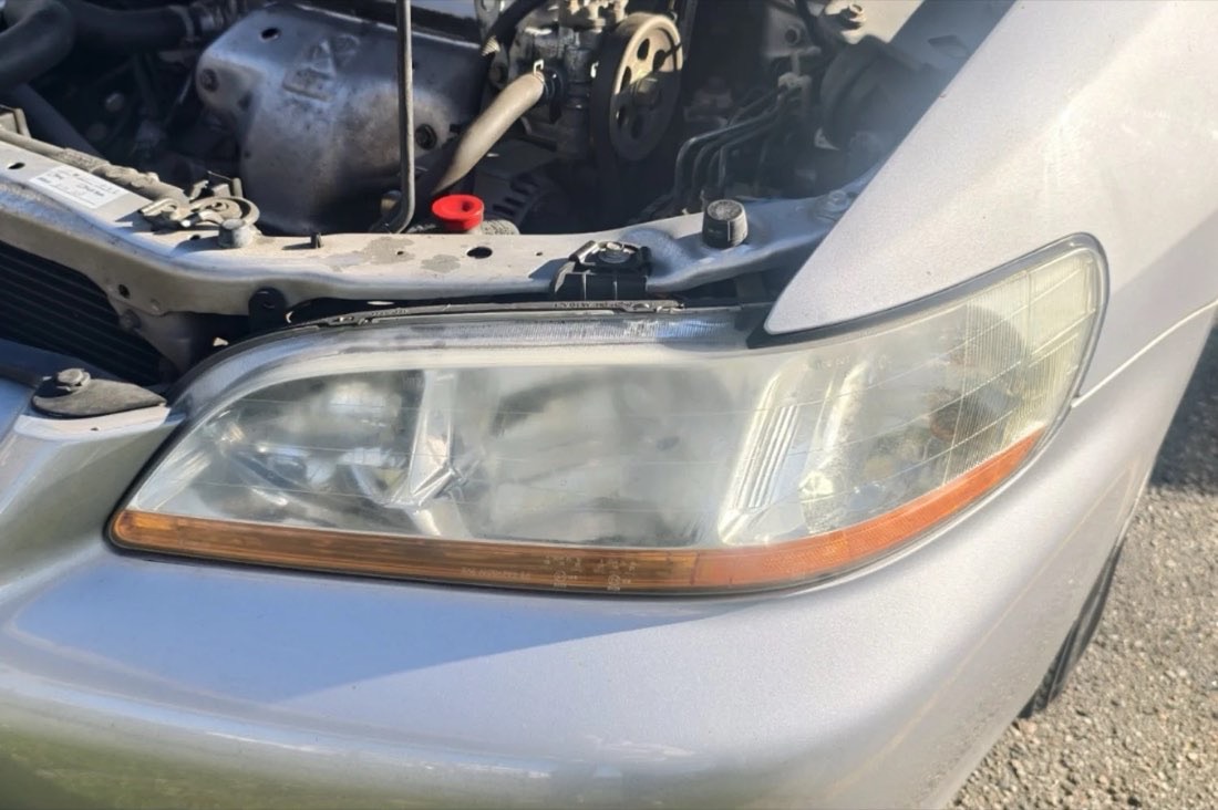 Honda headlights before detailing