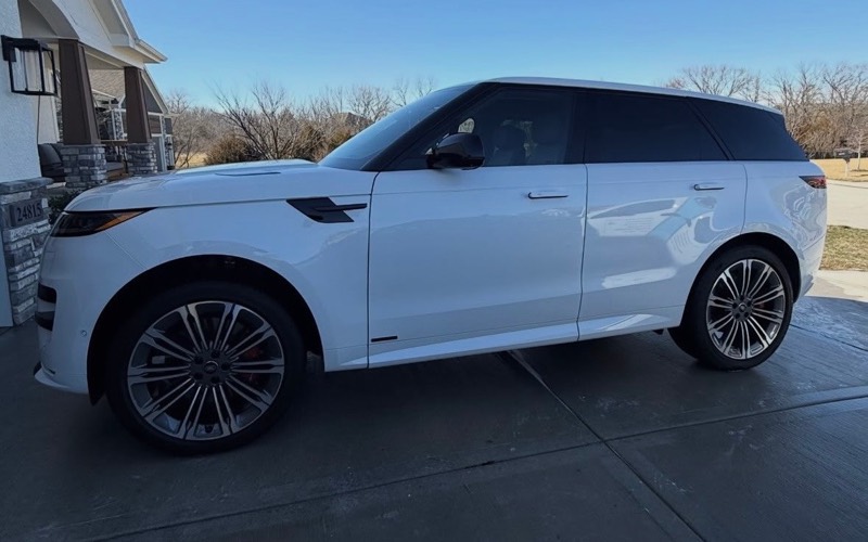 White Range Rover Sport detailed in a driveway