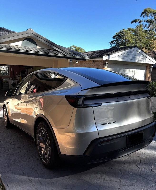 Silver Tesla after a wash and ceramic sealant